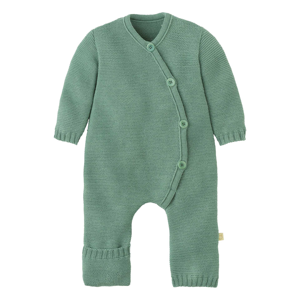 Green knitted baby romper on a white background