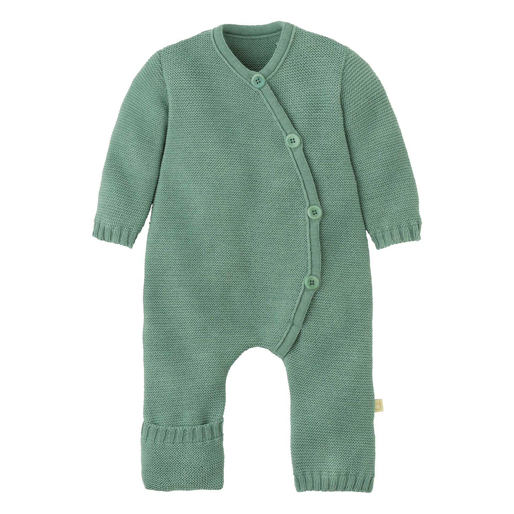 Green knitted baby romper on a white background